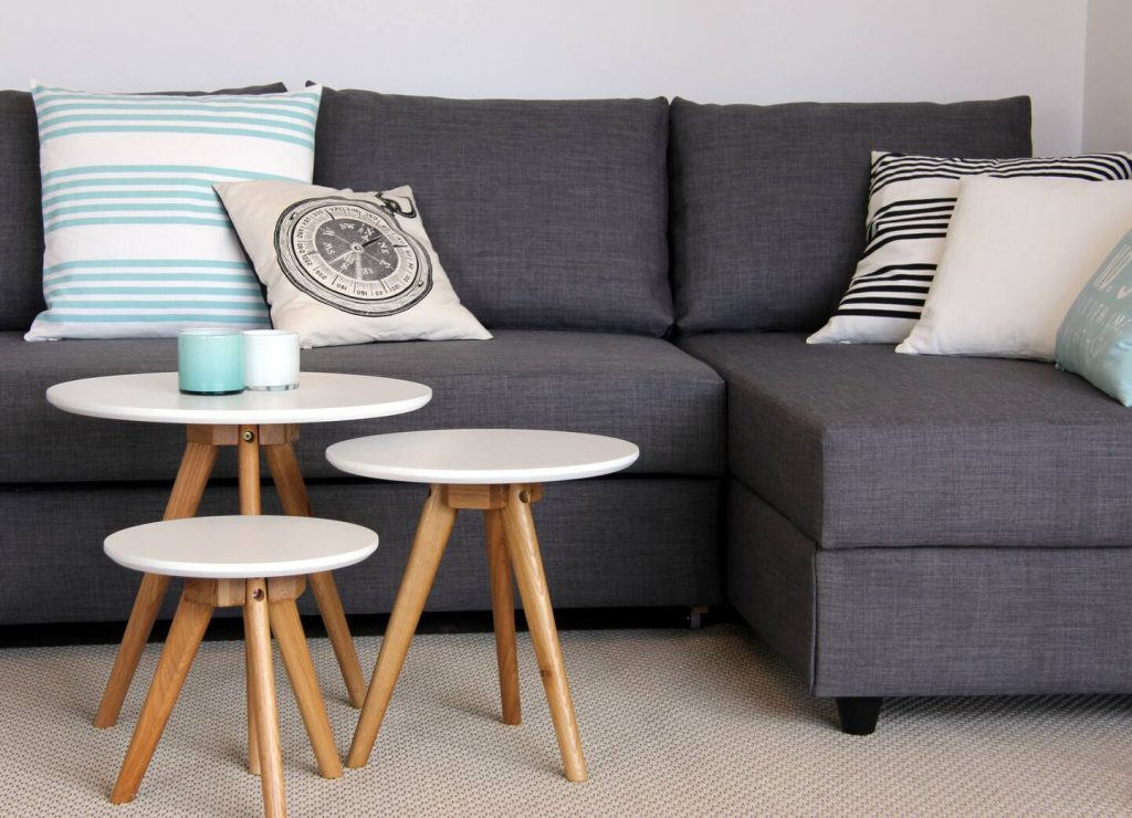 Ferienwohnung Südstrand IV, Wohnbereich mit Sofa
